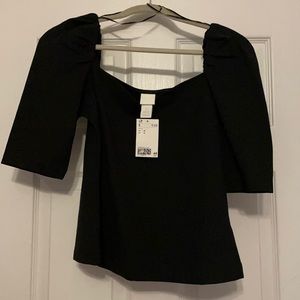 New with tags! Black puffed sleeve shirt from H&M